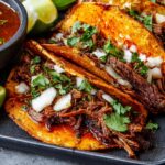 Close-up of flavorful birria tacos, a key recipe in The Ultimate Taco Tuesday Recipes Guide for Beginners.