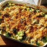 A bubbling hot broccoli casserole with a golden breadcrumb topping, a perfect veggie side dish.