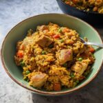 A close-up of a delicious chicken and vegetable rice bowl, part of our 12-minute Rice Bowls Recipes.