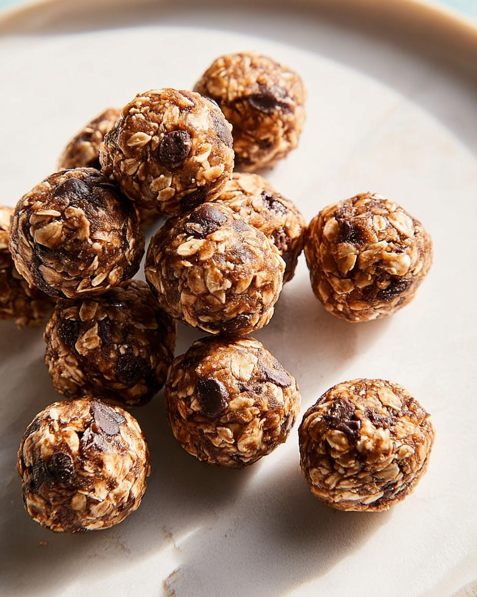 A pile of no-bake energy bites made with oats and chocolate chips, perfect for breakfast ideas.