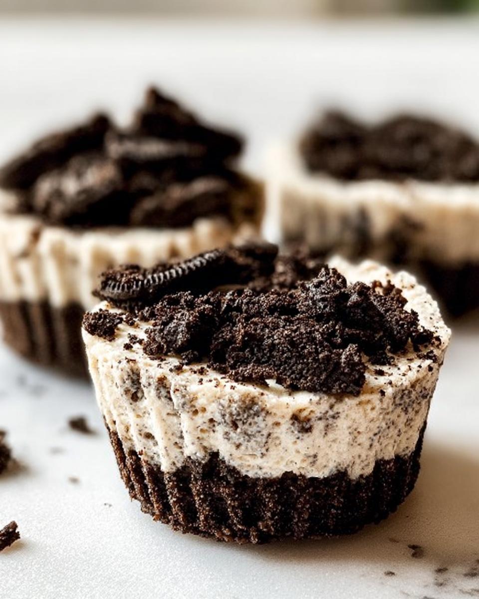 Close-up of a Healthy No-Bake Oreo Cheesecake Bite topped with crushed Oreos.